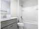 Bright bathroom featuring a tub and shower combination and gray vanity with light countertops at 3975 Silverstream Ter, Sanford, FL 32771