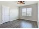 This bedroom offers hard surface floors and a ceiling fan at 3975 Silverstream Ter, Sanford, FL 32771