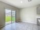 Bright breakfast area with sliding glass doors leading to the backyard, filled with natural light at 3975 Silverstream Ter, Sanford, FL 32771