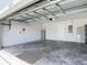 Two car garage with a painted floor, a door leading to the house and an automatic door opener at 3975 Silverstream Ter, Sanford, FL 32771