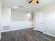 Upstairs loft area showcasing hardwood floors and abundant natural light, perfect for a study or play area at 3975 Silverstream Ter, Sanford, FL 32771