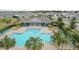 Aerial view of the neighborhood pool and clubhouse with ample seating at 3975 Silverstream Ter, Sanford, FL 32771