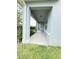 Covered front porch with columns and concrete flooring leading up to the front door at 3975 Silverstream Ter, Sanford, FL 32771