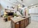 Open kitchen with island seating and views into the living area and staircase at 4334 Tolkien St, Orlando, FL 32828