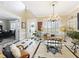 Well-lit living room showcasing large windows and beautiful tile floors at 4334 Tolkien St, Orlando, FL 32828