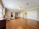 Bright and airy living room boasts hardwood floors, neutral walls, and plenty of natural light at 4334 Tolkien St, Orlando, FL 32828