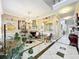 Elegant living room featuring a fireplace, tile floors, and natural light at 4334 Tolkien St, Orlando, FL 32828