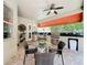 Outdoor kitchen featuring grill and countertop area with an adjacent patio seating area at 4334 Tolkien St, Orlando, FL 32828