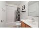 Compact bathroom featuring a tub with shower and a single sink vanity at 4531 Se 30Th St, Ocala, FL 34480