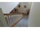 View of entryway featuring staircase with carpeted steps, white trim, and decorative wreath on the door at 4531 Se 30Th St, Ocala, FL 34480