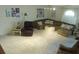 Cozy living room features a large sectional sofa, plush carpeting, and decorative Gathering accents at 4531 Se 30Th St, Ocala, FL 34480
