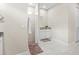 Bathroom featuring tile floors, vanity, and a tiled walk-in shower at 5531 Marys Villa Rd, Groveland, FL 34736