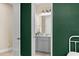 View into a bathroom from a stylish bedroom at 5531 Marys Villa Rd, Groveland, FL 34736