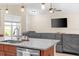 Open concept living space boasts granite countertops and stainless steel appliances at 5531 Marys Villa Rd, Groveland, FL 34736