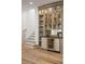 Stylish bar area with wine fridge and storage at 6047 Blakeford Dr, Windermere, FL 34786