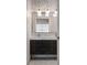 Modern bathroom with a floating vanity with drawers, white countertop, and decorative lighting fixtures at 6047 Blakeford Dr, Windermere, FL 34786