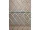 A close-up of an ornamental metal privacy screen with a diamond design at 6047 Blakeford Dr, Windermere, FL 34786