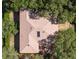 Aerial view of house showcasing roof detail and surrounding mature trees and landscaping at 636 Cheviot Ct, Apopka, FL 32712