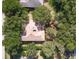 Aerial view of a home surrounded by mature trees, offering privacy at 636 Cheviot Ct, Apopka, FL 32712