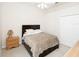 Bedroom features a bed, nightstand, and closet for storage at 636 Cheviot Ct, Apopka, FL 32712