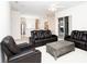 Inviting living room with slider access to patio, tiled floors and plenty of natural light at 636 Cheviot Ct, Apopka, FL 32712