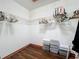 Walk-in closet with wood floor and wire shelving for organization and storage at 6970 Knightswood Dr, Orlando, FL 32818