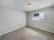 Bright bedroom featuring carpet flooring, natural light and fresh neutral paint at 7040 Hennepin Blvd, Orlando, FL 32818