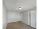 Bedroom with carpet flooring and bi-fold closet at 7040 Hennepin Blvd, Orlando, FL 32818