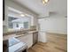 A well-lit kitchen boasts stainless steel appliances and granite countertops at 7040 Hennepin Blvd, Orlando, FL 32818