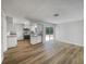 Open-concept kitchen and living area with natural light and sliding glass door at 7040 Hennepin Blvd, Orlando, FL 32818