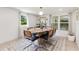 Bright dining room featuring a modern table and chairs, perfect for entertaining at 7102 Easter St, Winter Park, FL 32792