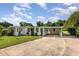 Charming single-story home with a covered carport and well-maintained front yard at 7102 Easter St, Winter Park, FL 32792