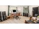 Sound studio with recording equipment and large windows providing great lighting for a recording session at 7102 Easter St, Winter Park, FL 32792
