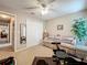Neutral bedroom featuring a sofa and closet with full-length mirror at 748 Andover Cir, Winter Springs, FL 32708