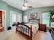 Comfortable main bedroom with a ceiling fan, carpeted floors, and access to the patio at 748 Andover Cir, Winter Springs, FL 32708