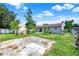 Large backyard featuring mature trees, a patio, and a partially fenced yard at 7807 Pine Hawk Ln, Orlando, FL 32822