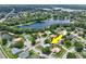 Aerial view of home with expansive lake view at 8248 Marbella View Ct, Orlando, FL 32817