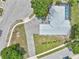 Bird's eye view of home with pool and gray brick driveway at 8248 Marbella View Ct, Orlando, FL 32817