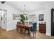 Elegant dining room featuring a wood table and natural lighting at 8248 Marbella View Ct, Orlando, FL 32817