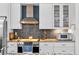Close up of the kitchen with stainless steel appliances at 8248 Marbella View Ct, Orlando, FL 32817