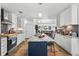 Kitchen featuring a large center island with stainless steel appliances at 8248 Marbella View Ct, Orlando, FL 32817