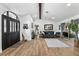 Bright and airy living room showcasing stylish decor and wood flooring at 8248 Marbella View Ct, Orlando, FL 32817