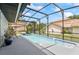 Relaxing screened-in pool with spacious deck and private backyard views at 8248 Marbella View Ct, Orlando, FL 32817