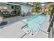 Backyard pool with screened-in lanai offering a perfect space for relaxation at 8248 Marbella View Ct, Orlando, FL 32817