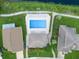 Overhead shot of a community pool near a lake at 826 Long Bay Ct, Kissimmee, FL 34741