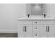 Modern bathroom featuring double sink vanity, a large mirror, and a glass shower at 826 Long Bay Ct, Kissimmee, FL 34741
