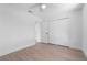 Bright bedroom featuring new paint and flooring, plus a spacious closet for storage at 826 Long Bay Ct, Kissimmee, FL 34741