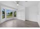 Bright bedroom featuring a bay window and a large closet for extra storage at 826 Long Bay Ct, Kissimmee, FL 34741