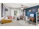 Bright bedroom features a workstation and built-in shelving providing lots of flexible living at 8308 Granada Blvd, Orlando, FL 32836