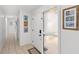 Light and airy foyer with tile flooring and a view towards the hallway at 8308 Granada Blvd, Orlando, FL 32836